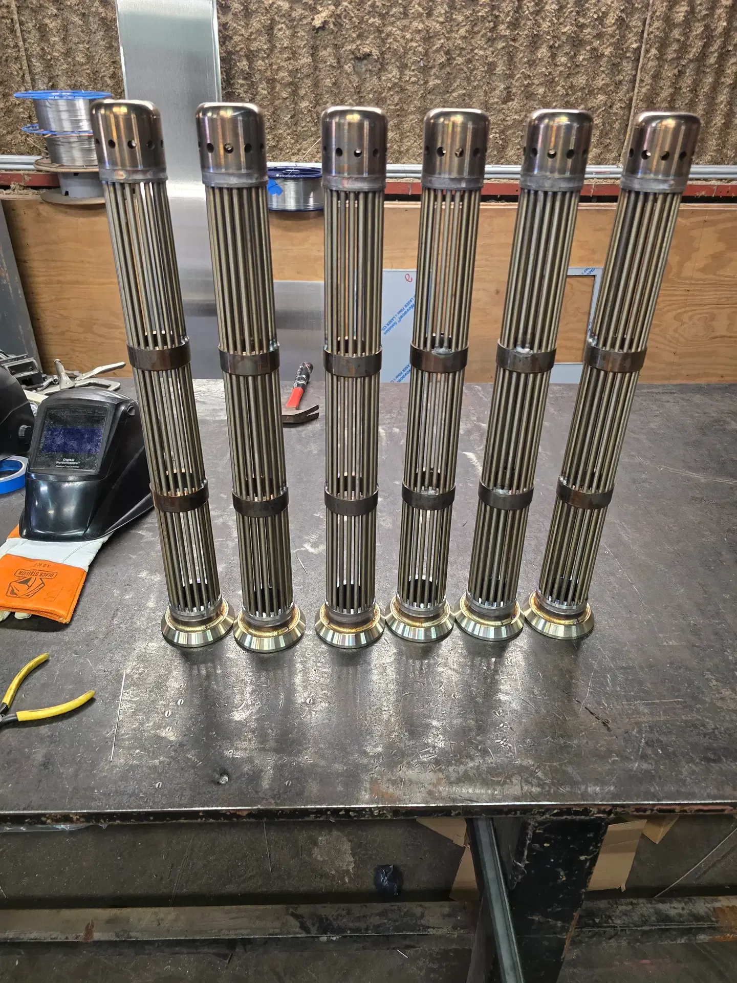 Six stainless-steel filter assemblies with precision-welded joints